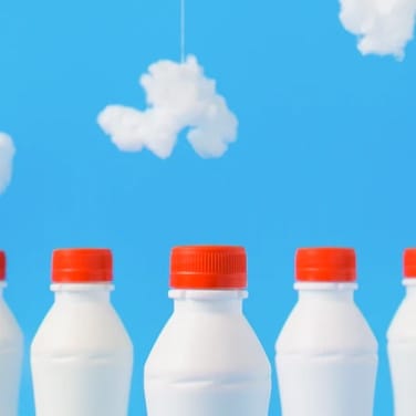 milkbottles on blue background